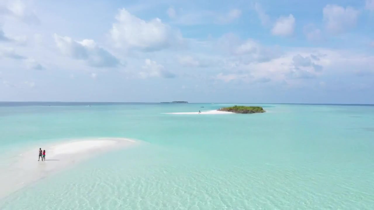 Turquoise Caribbean water beside a tropical island